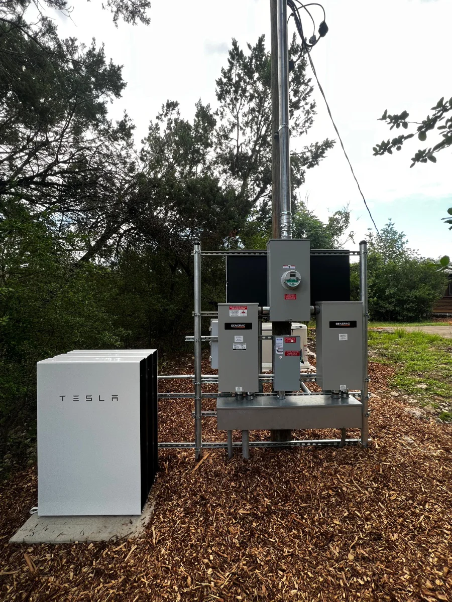Tesla Powerwall battery with Generac panels and meter base